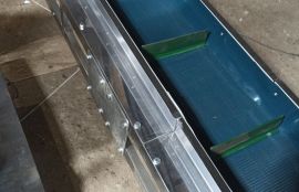 L-образный ленточный конвейер для транспортировки свинцовых пластин для компании АО 