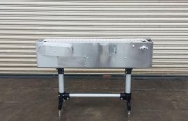 Объект: Конвейер пластинчатый с пластиковой цепью для  транспортировки упакованных шлангов ПВХ после термосушки