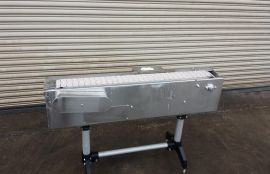 Объект: Конвейер пластинчатый с пластиковой цепью для  транспортировки упакованных шлангов ПВХ после термосушки