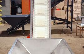 Конвейер с бункером для дозированной подачи и перемещения таблеток для компании «Квадрат - С» (бренд «Витамир») - фото 2