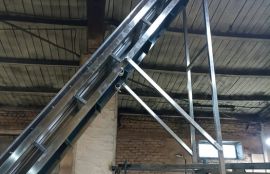 L-образный ленточный конвейер для транспортировки свинцовых пластин для компании АО 